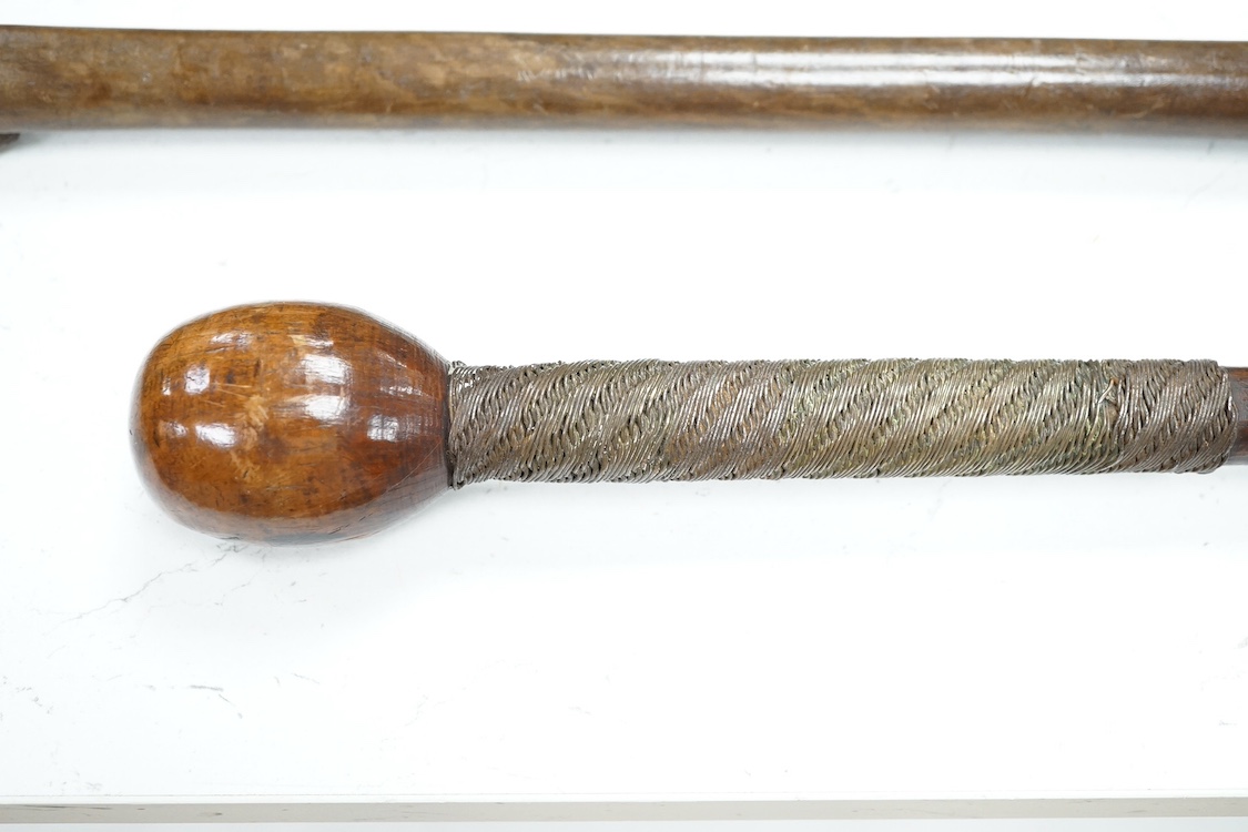 Tribal interest: Three carved hardwood African staffs, longest 148.5cm. Condition - good considering use and age